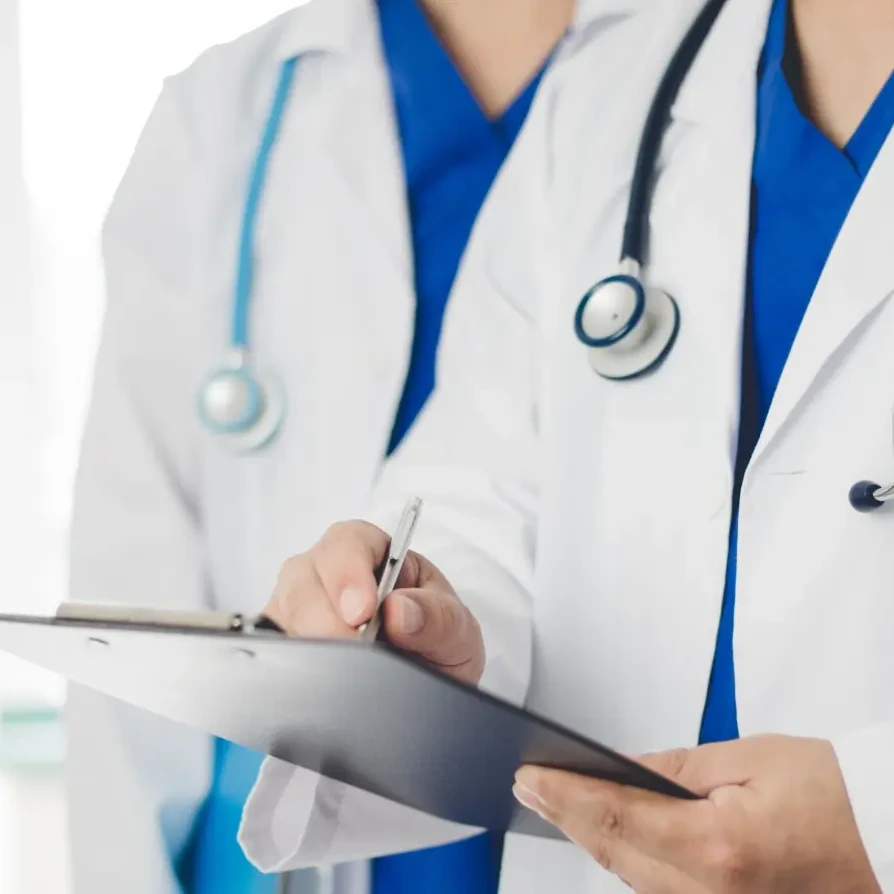 doctor helping with medical component of after care treatment plan