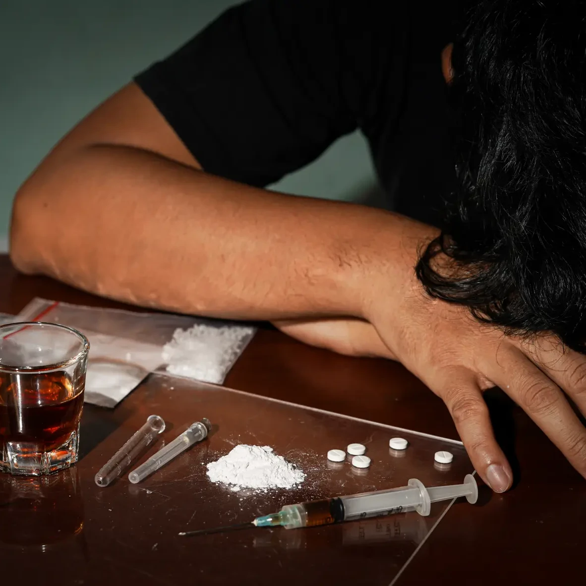 man alone struggling with drug and alcohol addiction, who could use a drug and alcohol intervention